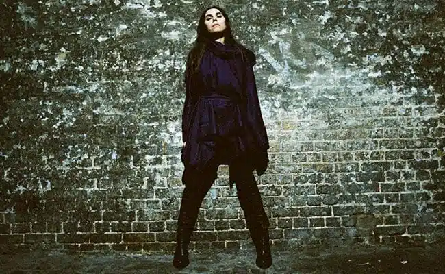 PJ Harvey – “The Community of Hope” (Singles Going Steady)